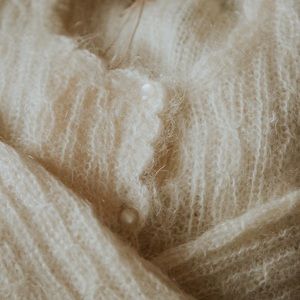 Vintage romantic ivory mohair sweater with pearlescent buttons